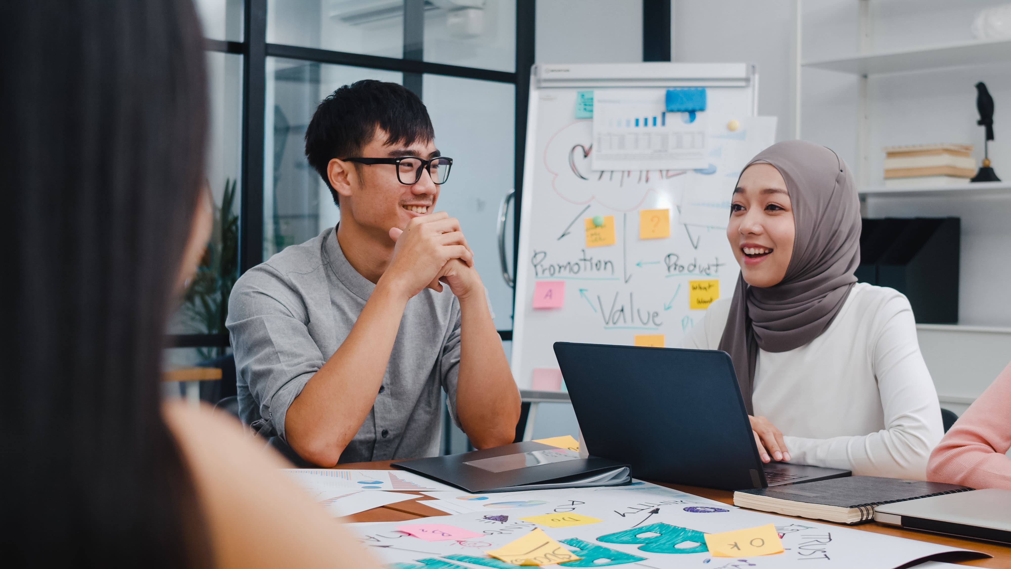 A diverse team collaborating in a modern office environment.